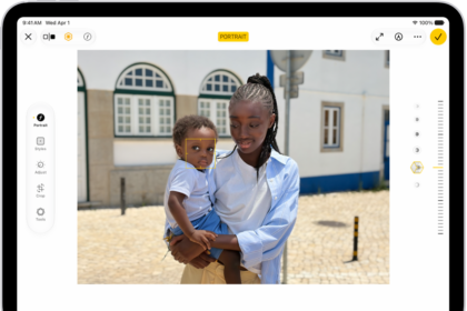 The Edit screen of a Portrait mode photo. The photo is in the center of the screen and on the right side of the screen are the Portrait Lighting effect options. Stage Light is selected and there is a slider to adjust the level of the effect. On the left side of the screen are the Portrait, Adjust, Filters, and Crop buttons. The Portrait button is selected.