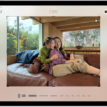 The Edit screen in the Photos app with a photo in the center. On the left side of the screen are the Adjust, Filters, and Crop buttons; the Crop button is selected. On the right side of the screen are the crop enhancement options and a slider to adjust the level of the effect.