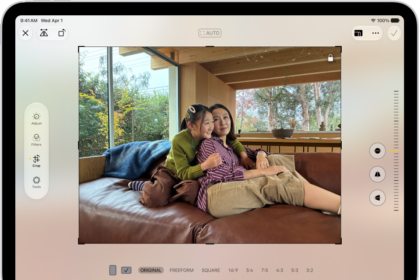 The Edit screen in the Photos app with a photo in the center. On the left side of the screen are the Adjust, Filters, and Crop buttons; the Crop button is selected. On the right side of the screen are the crop enhancement options and a slider to adjust the level of the effect.